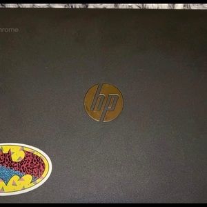 Charger included . Sticker will be taken off